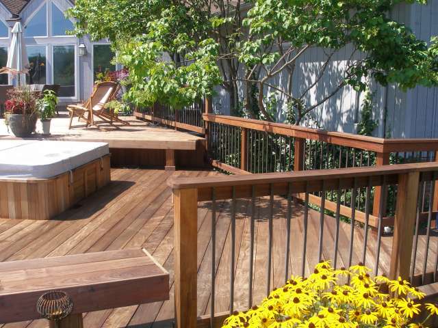 Main deck and built in spa in Solon Ohio, designed by landscape architect.